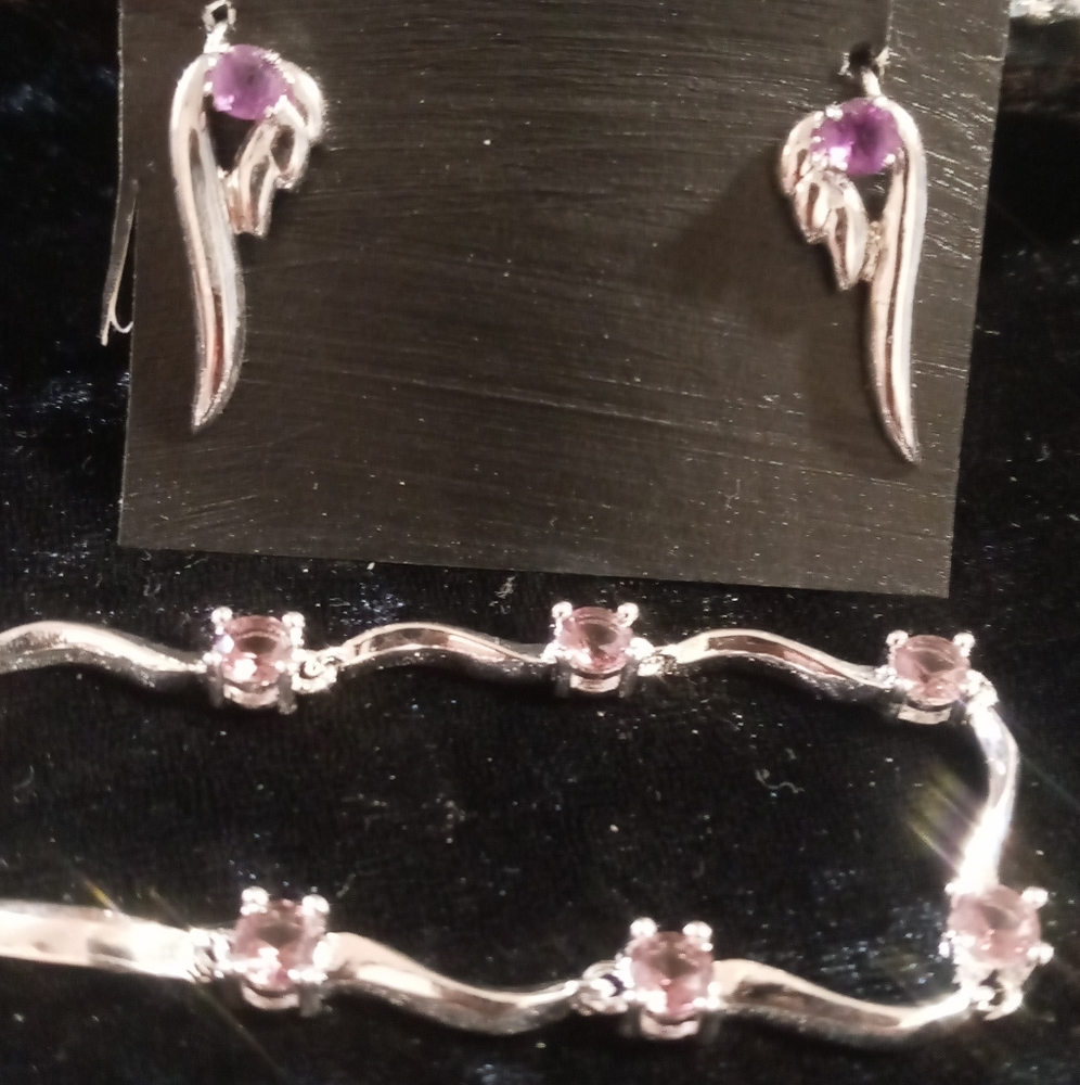 Tennis bracelet sterling 925 bracelet with a angel wing earring & amethyst.